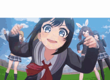 a girl in a school uniform with bunny ears points her finger at the camera