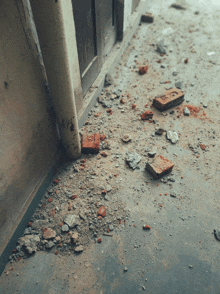 a pile of rocks and bricks on the floor