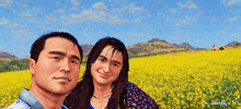 a man and a woman are posing in a field of yellow flowers