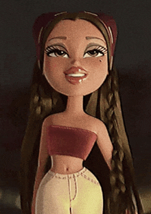 a doll with long brown hair is wearing a red top