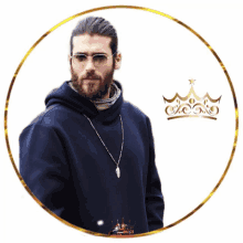 a man with glasses and a beard is in a circle with a crown