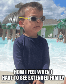 a young boy wearing sunglasses stands in front of a swimming pool with the caption how i feel