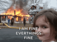 a little girl says i am fine everythings fine in front of a house on fire