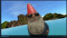 a gnome wearing sunglasses and a red hat stands in front of a body of water and mountains