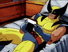 a cartoon of wolverine laying down reading a book
