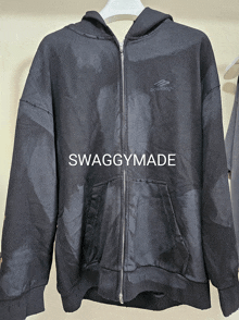 a black sweatshirt with the word swaggymade on the bottom