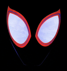 a close up of spider-man 's eyes with a black background