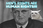 a black and white photo of a man with the words men 's rights are human rights behind him