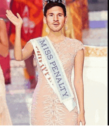 a man is wearing a sash that says miss penalty on it