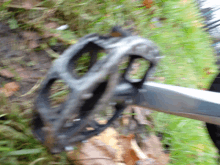 a close up of a bicycle pedal with a blurred background