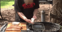 a man with a beard is grilling hot dogs with the words griddled hot dogs technique below him