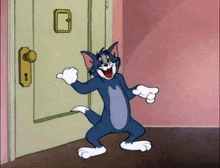 tom from the cartoon tom and jerry is standing in front of a door in a room .