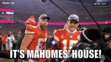 two football players are standing next to each other and one of them says it 's mahomes house