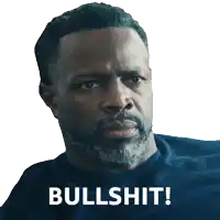 a man with a beard has the words bullshit written on his face