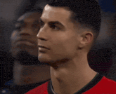 a close up of a man 's face and neck