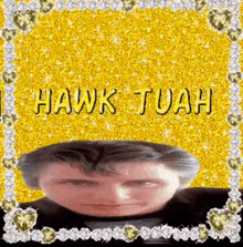 a close up of a man 's face with the words `` hawk tuah '' written on it .