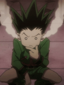 a young boy with green hair is sitting down with his hand on his chin and smoke coming out of his ears