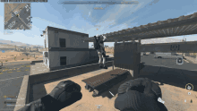 a screenshot of a video game shows a person holding a gun