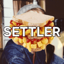 a person holding a sandwich with ketchup and french fries with the word settler above it