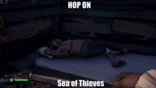 a man laying on a bed with the words hop on sea of thieves on the bottom