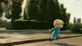 a little boy in a blue outfit is being pulled by a leash