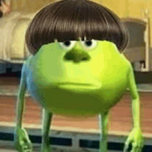 mike wazowski from monsters inc is wearing a wig .