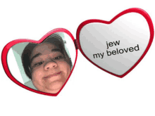 a heart shaped mirror says jew my beloved on it