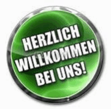 a green button with the words `` herzlich willkommen bei uns '' on it .