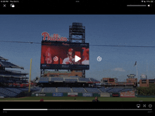 a video of a phillies baseball game is being played on a tablet