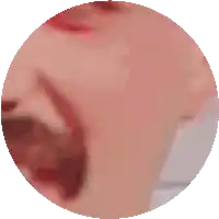 a close up of a person 's face in a circle