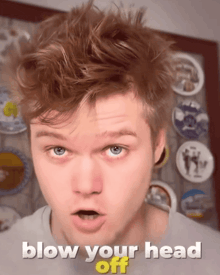 a young man with a surprised look on his face and the words blow your head off