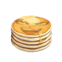 a stack of pancakes with syrup and butter with a face on them