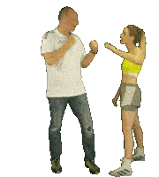 a man and a woman are giving each other a high five and the man is wearing a white erima shirt