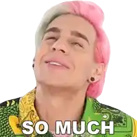 a man with pink hair is wearing a green shirt that says so much on it