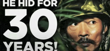 a man in a military uniform with the words he hid for 30 years below him