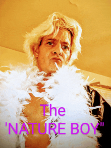 a man with feathers around his neck and the words " the nature boy "