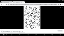 a black and white drawing of hearts with faces on them is on a tablet screen .