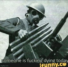a soldier wearing a gas mask is holding a bunch of bullets in a black and white photo .