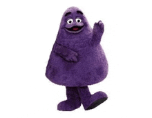 a purple cartoon character is standing on a white background .