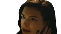 a close up of a woman talking on a phone