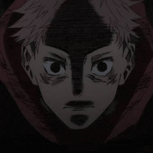 a close up of a man 's face with a shadow on his face .