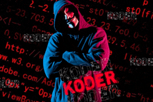 a man in a hoodie stands in front of a coding background that says " koder "