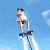 a man is carrying a woman on his shoulders while standing on top of a rocket .