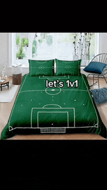 a bed that has a soccer field on it