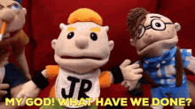 a group of puppets are standing next to each other and one of them has a shirt that says jr on it