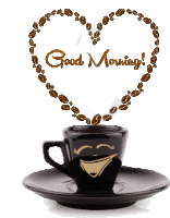 a cup of coffee on a saucer with a heart made of coffee beans and the words " good morning "