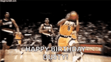 a basketball player is jumping in the air while holding a basketball and says `` happy birthday dusty ! ''