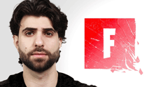 a man with a beard stands in front of a red f