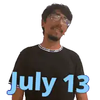 a man wearing glasses and a black shirt with the date july 13