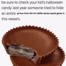 a reese 's peanut butter cup with a picture of a person inside of it